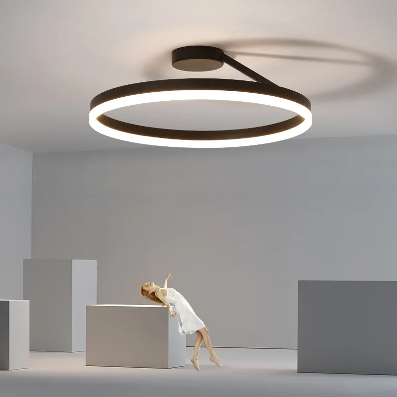 Modern Minimalist Dimmable Ring - shaped LED Ceiling Chandelier. Ideal for illuminating dining and living room center tables, as well as for bedroom decor.