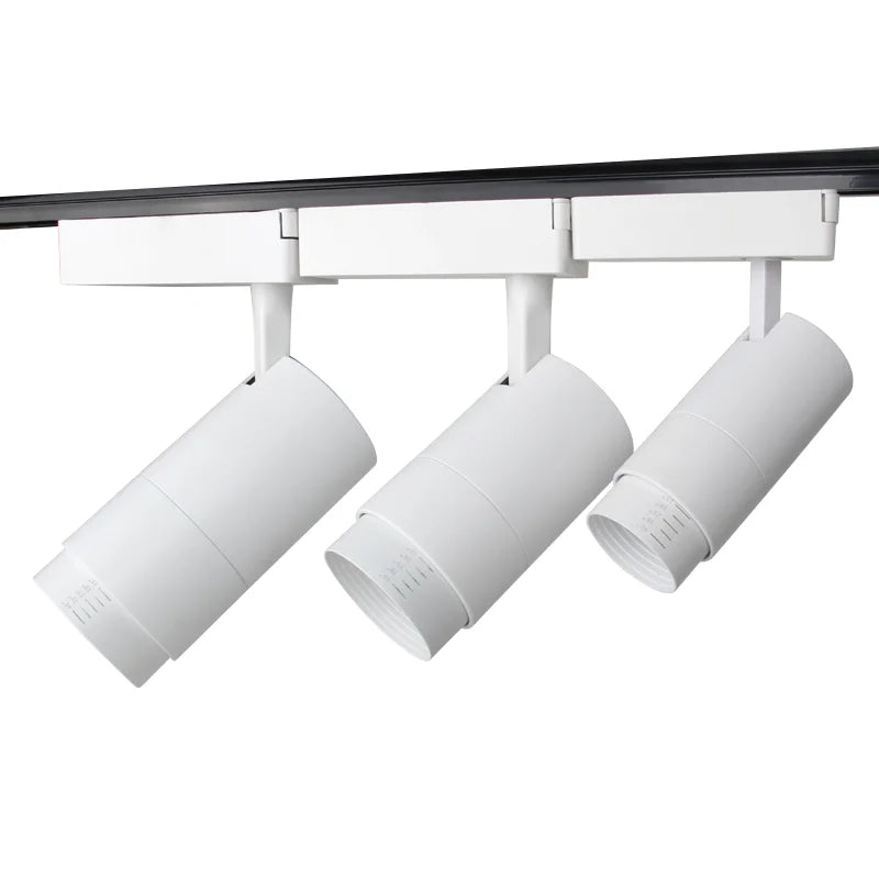 Clothing Shop - Oriented Dimmable COB LED Track Lights. 3 - color options, zoomable, with 10W, 12W, 20W, 30W choices and focus - adjustable rail.