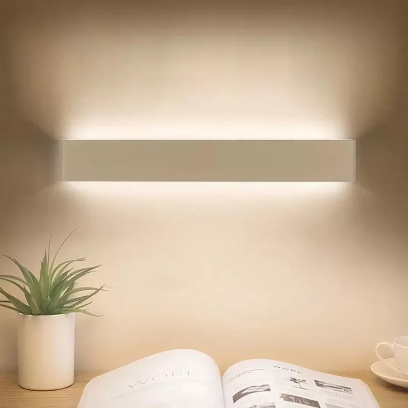Modern Aluminum LED Wall Sconce for Indoor Decor. Ideal for bedrooms and living rooms, available in 3 styles for home wall lighting.