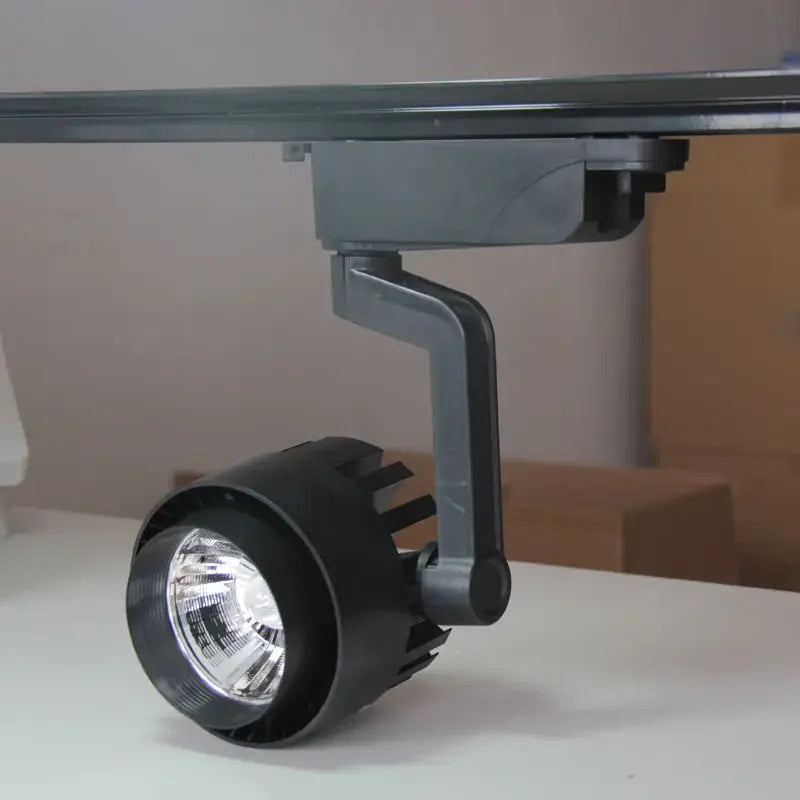 Commercial - grade Electric Dimming Track Lights. Modern store - suitable spot rail with adjustable heads, available in 15W, 20W, 30W, 35W, and 36W options.