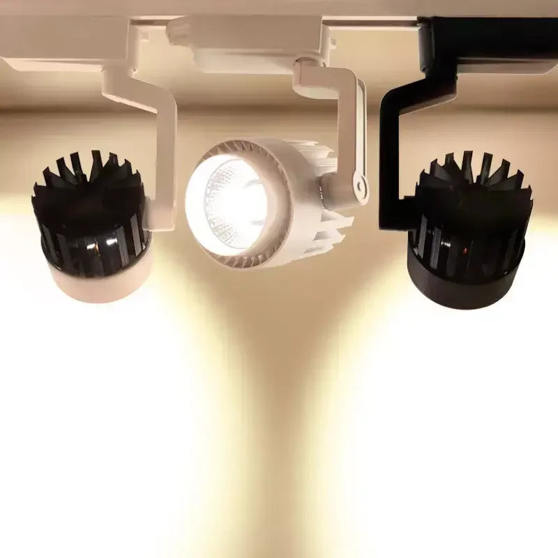 Commercial - grade Electric Dimming Track Lights. Modern store - suitable spot rail with adjustable heads, available in 15W, 20W, 30W, 35W, and 36W options.
