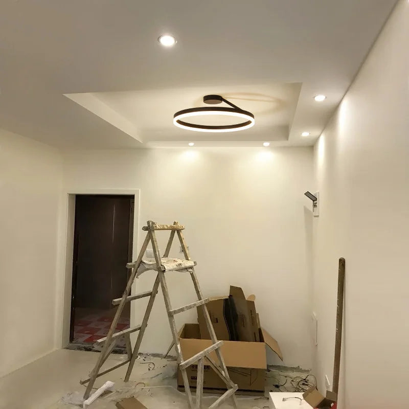 Modern Minimalist Dimmable Ring - shaped LED Ceiling Chandelier. Ideal for illuminating dining and living room center tables, as well as for bedroom decor.