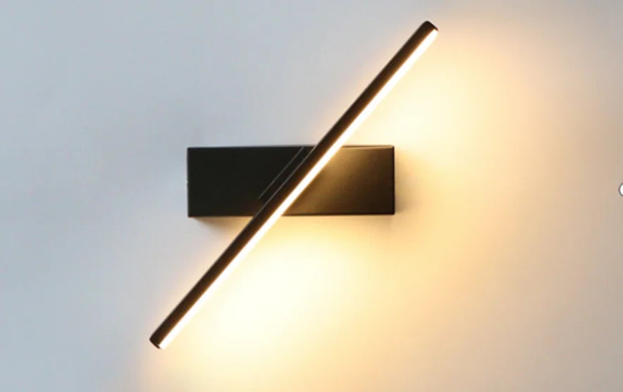 AC90 - 260V Bedroom Bedside Wall Light. Made of aluminum, this simple light fixture features a 330° rotatable adjustable light angle for versatile illumination.