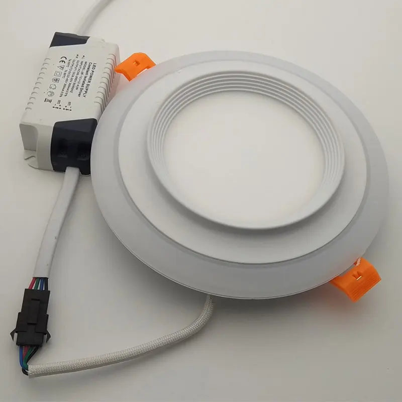 CE & ROHS - Certified Double - Color Round LED Panel Downlights. Available in 5W, 9W, 16W, 24W, with 3 modes, suitable for recessed ceiling installation and operating on AC85 - 265V.