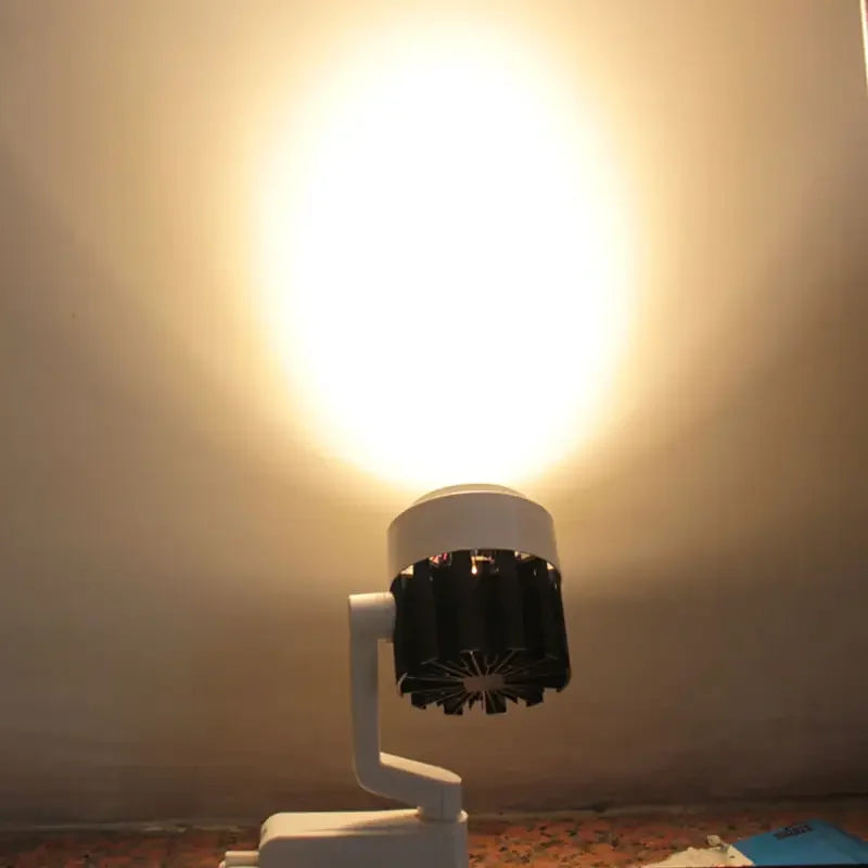 Commercial - grade Electric Dimming Track Lights. Modern store - suitable spot rail with adjustable heads, available in 15W, 20W, 30W, 35W, and 36W options.