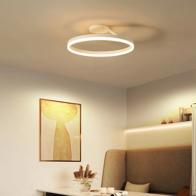 Modern Minimalist Dimmable Ring - shaped LED Ceiling Chandelier. Ideal for illuminating dining and living room center tables, as well as for bedroom decor.