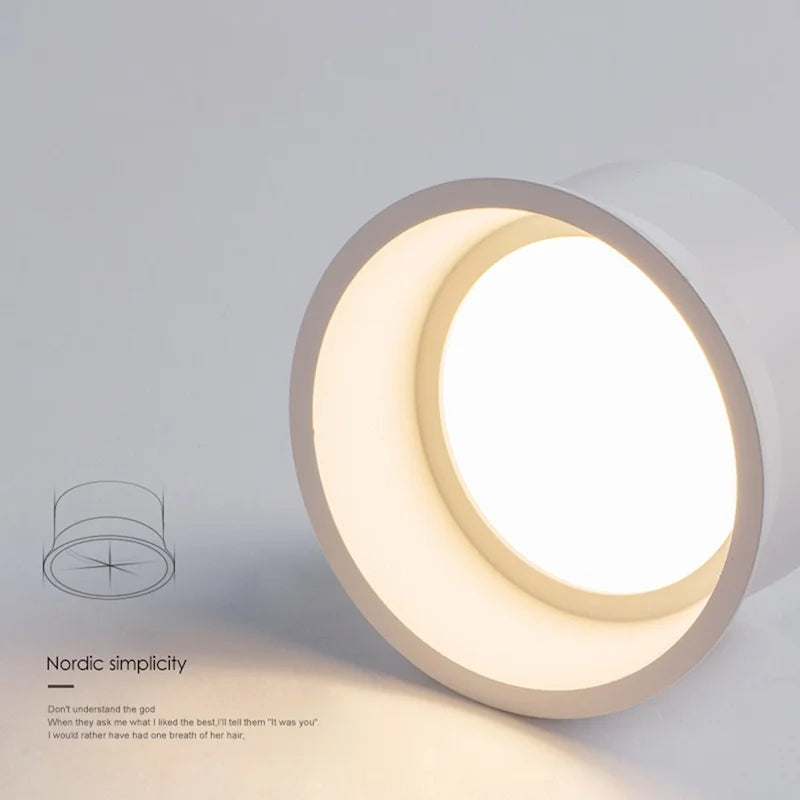 Recessed, Dimmable LED COB Downlights with Anti - glare Feature. Available in black and white, operating on 85 - 265V. Ideal for home living rooms and bedrooms as ceiling spot lights.